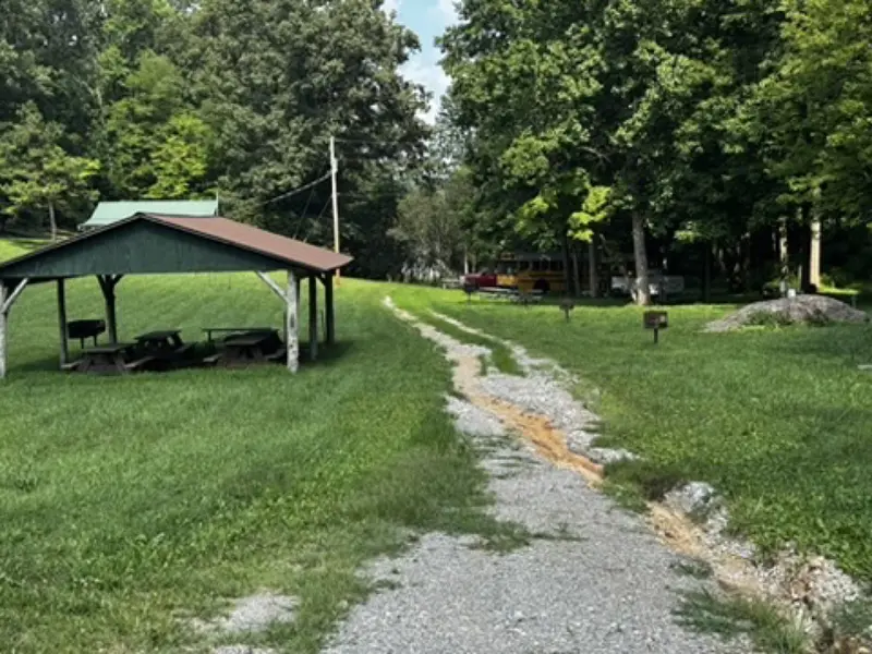 Shelter and gravel path through the camp